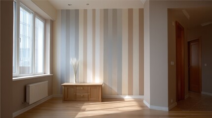 Empty living room corner with striped wallpaper and wooden flooring