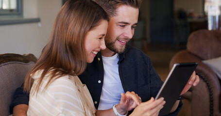 Happy, couple and people with tablet, house and planning for trip, together and talk in living room. Bonding, man and chat with woman, smile and purchase of tickets or booking flight on web in home