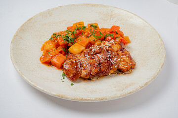 Tender chicken glazed to perfection paired with colorful roasted vegetables garnished with herbs