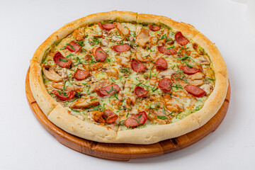 Freshly baked pizza features a variety of toppings, including succulent chicken and spicy pepperoni