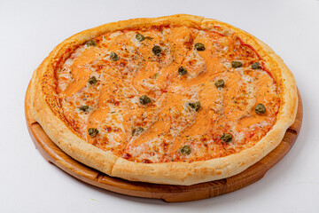 This delectable pizza features a crispy crust layered with cheese, smoked salmon, and capers