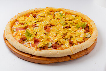 A colorful pizza is topped with cheese, veggies, and meats, ready to enjoy!