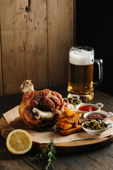 Roasted Pork Knuckle with Beer and Potatoes