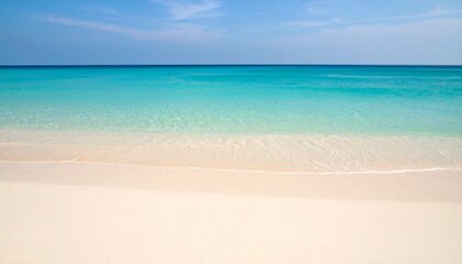 Obraz premium Serene tropical beach with calm turquoise water and pristine white sand.