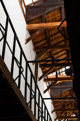 Obraz premium low angle view of the wooden structure at the museum building