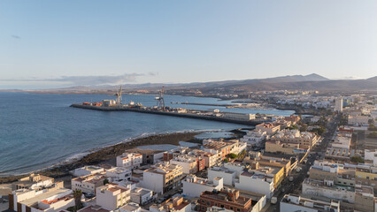 Aerial view of Puerto del Rosario streets with mural art on building facade, Fuerteventura, Canary Island © Bentayga