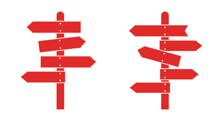 Red directional signs on two posts with multiple arrows pointing different ways silhouette