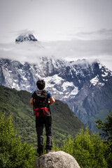 Obraz premium hiker in front of the Yaomei Feng summit, 6250 m. Haizigou Valley, Mount Siguniang National Park, Qionglai Mountains, Sichuan, China