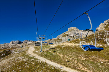 Chair lift on the way to Piz Boe at the Dolomites, Italy
