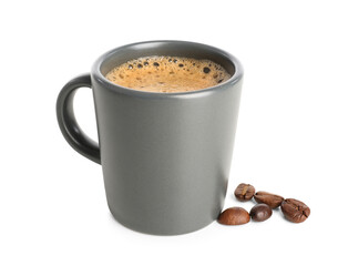 Cup of delicious espresso  with coffee beans on white background
