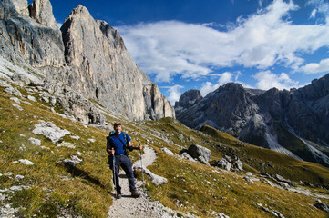 Obraz premium Trekking in the Alpe di Siusi in the Dolomites of Italy