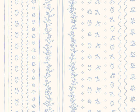 Hand drawn cottage core seamless border set with a charming delicate design. Soft blue pastel florals, fruits and lines, perfect for romantic vintage-inspired decor.
