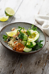 Couscous bowl with avocado and pepper sauce