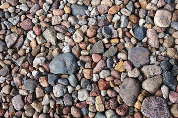 Selective focus, river stone background, material for construction materials