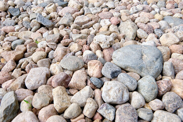 River stones lying. Top view backgrounds and texture
