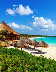 Tropical beach scene with thatched huts