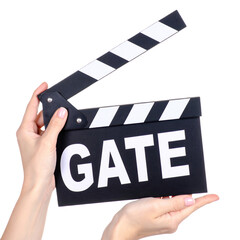 Obraz premium A person holds a black and white film clapperboard with the word 