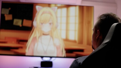 Watching Japanese anime with cute anime girls on big screen television at home cinema