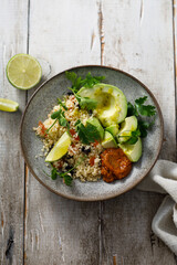 Couscous bowl with avocado and pepper sauce