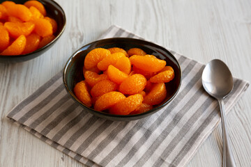 Organic Canned Mandarin Oranges in a Bowl, side view.