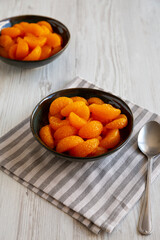 Organic Canned Mandarin Oranges in Bowls, side view.