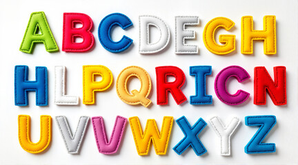 Colorful plastic alphabet letters on white