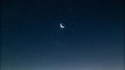 Naklejka premium Minimalist Crescent Moon in Dark Sky
