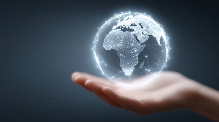 Global Connection: A human hand cradles a luminous digital rendering of planet Earth, symbolizing interconnectedness, communication, and the boundless scope of the digital age.