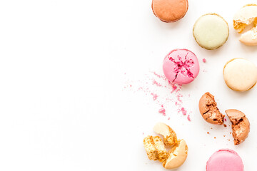 Fototapeta premium Macarons design on white background top view space for text