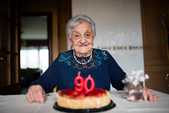 Portrait of senior woman celebrating her ninetieth birthday