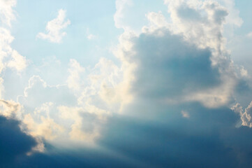 Beautiful storm clouds on a summer night with pinks and blues.