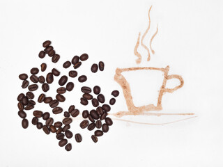 Coffee beans scattered beside a coffee-stained silhouette of a steaming cup.