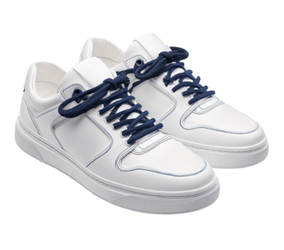 Pair of white leather sneakers with navy blue laces