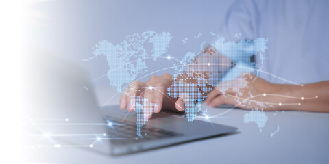 A man is using a smartphone and tablet to search for information. Global Data Interface and Business Network Visualization Projected on Virtual Screen.