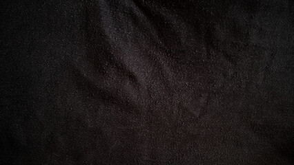 knittriger Stoff, dunkler Hintergrund