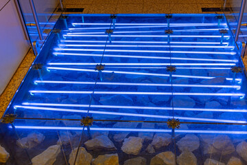 Blue Neons Under Glass Floor Electric Glow Effects Decor