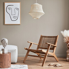 Fototapeta na wymiar Modern concept of living room interior with design modular sofa, rattan armchair, dried flowers in vase, coffee table, decoration and elegant personal accessories in stylish home decor. Template.