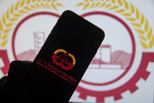 Rheinbach, Germany  18 August 2025,  The brand logo of the food company "Oman Flour Mills Company" on the display of a smartphone (focus on the brand logo)