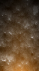 Dark textured surface with warm orange lighting gradient creating a smoky, cloud-like effect
