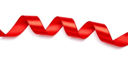 A vibrant red ribbon curls elegantly on a plain white background.