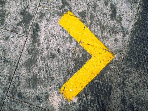 Yellow right arrow