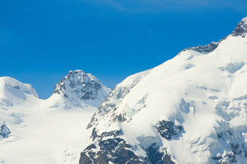 Swiss Alps with the peak Crast Aguzza seen from Morteratsch Glacier - Bernina range, Switzerland