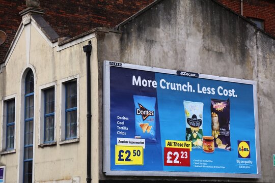 BELFAST, UK - JUNE 22, 2024: Billboard advertisement operated by JCDecaux for Lidl supermarket chain in Belfast, Northern Ireland.