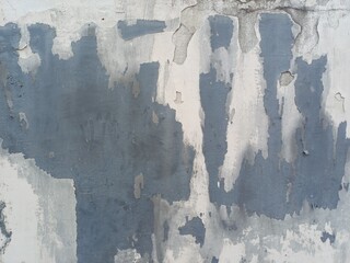 grunge wall background, a wall with peeling paint, underlying layers