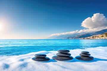 Obraz na płótnie Canvas Zen stones on a snowy beach, ocean view