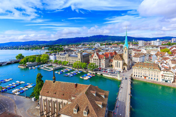Zurich, Switzerland. View of the historic city center with famous Fraumunster Church, on the Limmat river.