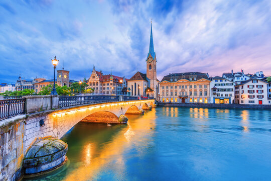 Zurich, Switzerland. View of the historic city center with famous Fraumunster Church, on the Limmat river. - Powered by Adobe