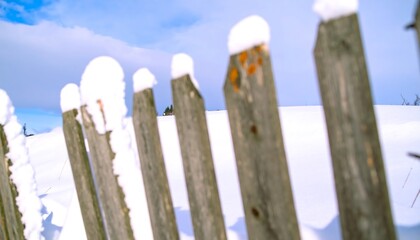 Snowy wooden fence