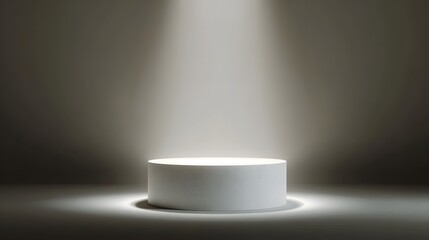 Fototapeta premium Illuminated white podium with dramatic lighting and shadows