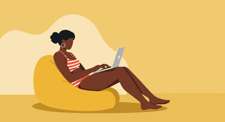 Relaxed woman in swimsuit using laptop on a bean bag, symbolizing remote work, summer vacation, or digital nomad lifestyle.